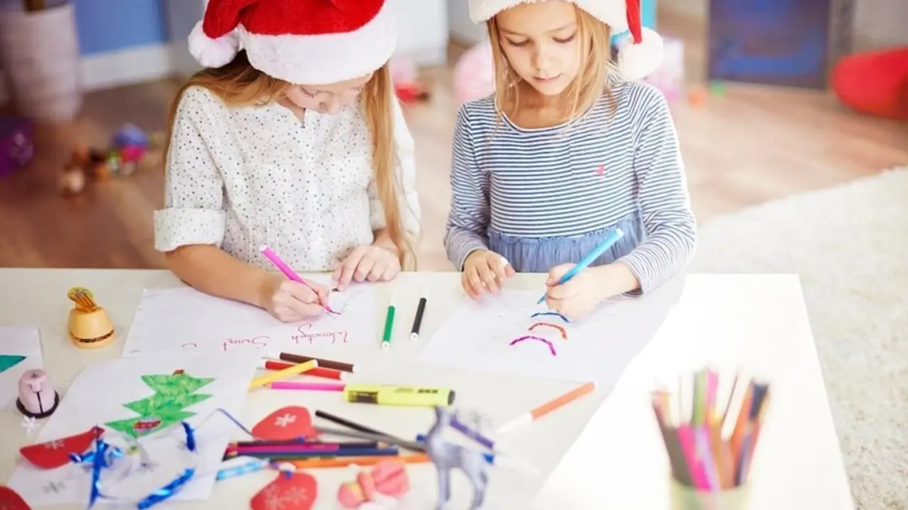 Best friends making some christmas ornaments
