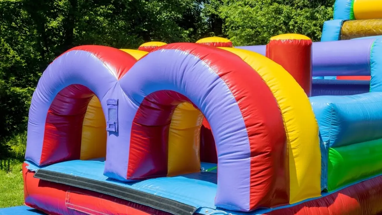Funny off kids in the plays in an castle inflatable slides